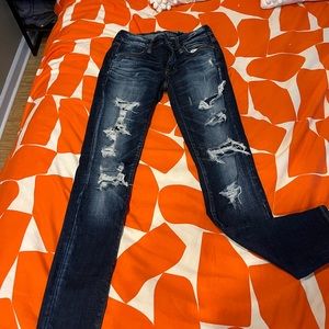 American Eagle Distressed Midrise Jegging